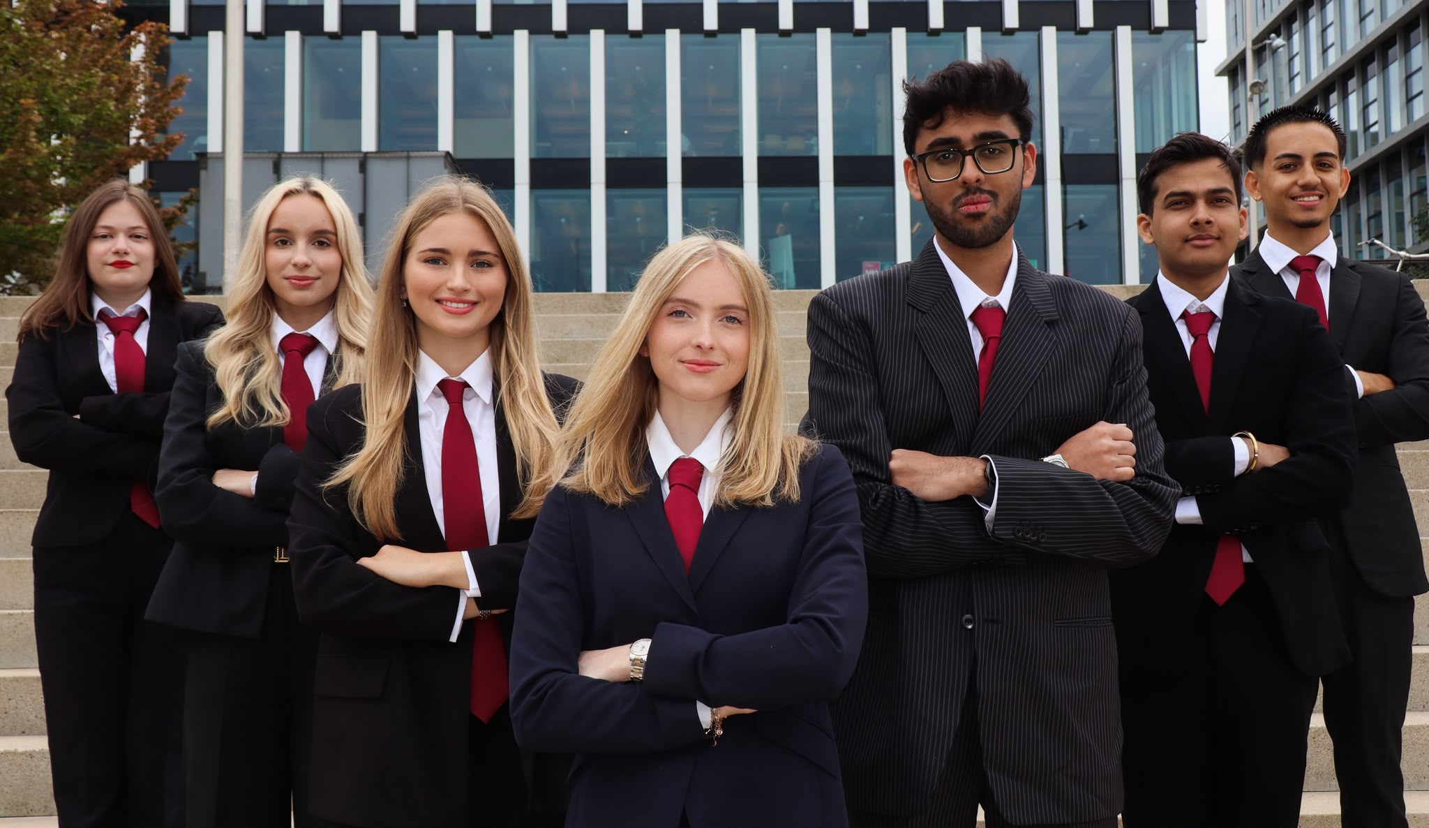 IFSA Rotterdam members in formal attire on the steps of the university building